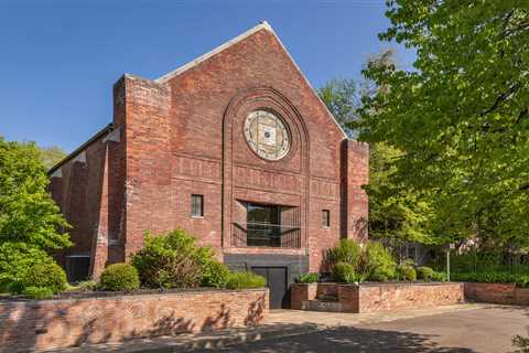 A woman with a soft spot for 'old tatty buildings' turned an abandoned 1930s abbey into a..