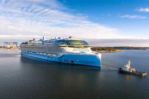 Watch the new world's largest cruise ship pass under a bridge with only feet to spare