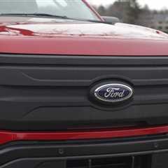 Ford cancels electric three-row SUV, pivots to hybrid